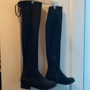 Thigh high black boots